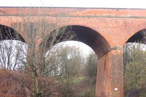 Queens Rd. bridge from wooden bridge over R.Irk.