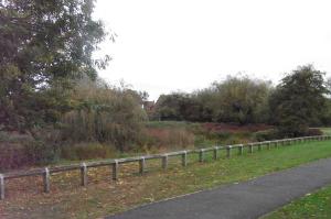 Dried up pond in grass area near Church,
between waypoints 4 and 5