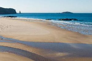 A viking longboat is said to be buried under the shifting sands of Sandwood Bay
