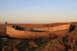 The saltmarshes are littered with the shells of abandoned fishing boats