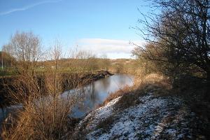 This photograph shows a view of the River Wear near Shincliffe Bridge. A part of Maiden Castle (the University of Durham