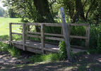 Wooden bridge and way marker