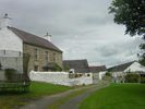 Go through a gate (or use the stone stile beside it) when you reach the attractive buildings at Cwmdwyfran.