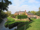 A pretty location on the River Wreake. The Leicestershire Round footpath passes over the metal bridge.