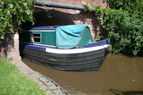 Narrow boat travelling on Trent and Mersey Canal, Stone, Staffordshire