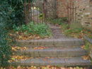 Steps down from path round cricket ground
