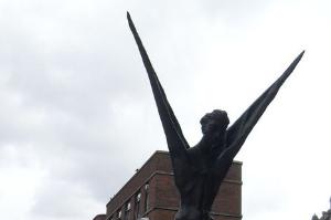 Statue of the Phoenix in Bull Yard. The cathedral spire is visible in the background