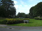 Grassed area with trees on the corner of Ferrers Close