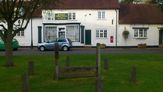 Berkswell Post Office and stocks. was the 5th hole for a one legged drunkard?