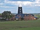The tower of Long Clawson Mill at the top of Mill Lane