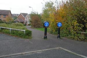 Go through pedestrian/cycle markers at way point 6