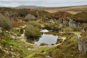 Looking down into Haytor Quarry with Smallacombe Rocks in the middle distance