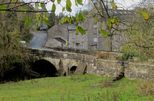 Airton Bridge with coverted mill beyond.