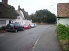 3- Wrights Row, belonging to the Cambridgeshire Cottage Improvements Society, at the junction of High Street and Coton Road.  The Coton Road bus shelter is within 100 metres of the junction.