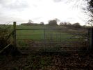Photo 20 - Go through this gate and continue straight ahead beside the field.  There is a large ditch parallel to the path on the right hand side.