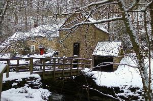 A winter landscape showing Knowles Mill