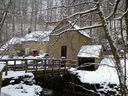 A winter landscape showing Knowles Mill