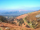 View over the Brecon Beacons from Waypoint 8, with Sugar Loaf on the horizon