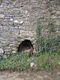Old clome oven set in wall of building at Cumble Tor Farm