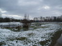 View across pond and play area in Astill Lodge Park