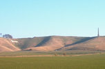 The Cherhill White Horse and Lansdowne Monument, viewed from the A4 at Cherhill