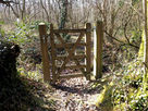 From Footbridge, turn right, over more marshy ground, to a Gate.
