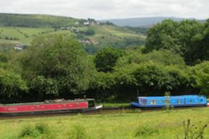 The Goyt Valley and Peak Forest Canal looking back towards New Mills from the approach to Disley.