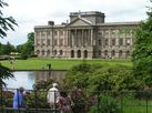 Lyme Park house, lake and gardens as viewed from the path.
