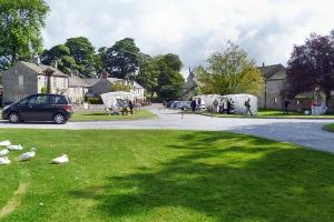 Foolow village at well dressing time