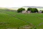 Looking back across Bretton Clough to Grange Farm