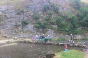 The crowds queuing to get over the stepping stones in Dovedale.