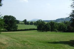 View towards the Malvern Hills on the descent from Hillend Farm between waypoints 3 and 4.