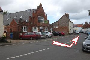 Leave the YHA and turn left into High Street.