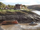 River Stations and old lifeboat at the entrance to Sea Mills Harbour