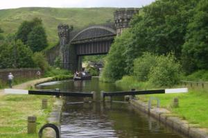 Skew Bridge on the Rochdale Canal, viewed from Shade Lock - walking towards Gauxholme.  Part of the Pennine Waterway