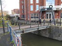 Looking across footbridge at Castle Ditch to the site of the medieval Water Gate