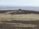 The Cairn on the edge of Totley Moor (marking the beginning of the descent to Totley), with the southern outskirts of Sheffield in the background.